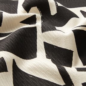 Decostof Jacquard abstracte structuur – zwart/ecru, 