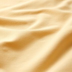 Licht katoenen sweatstof effen – vanillegeel, 