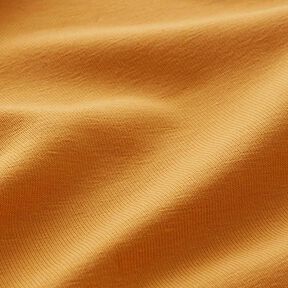 Katoenjersey medium effen – currygeel, 