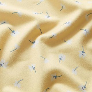 Polyesterjersey kleine paardenbloemen – vanillegeel, 