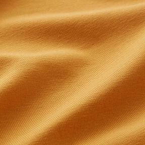 Katoenjersey medium effen – currygeel, 